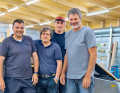 L'équipe : le PDG Matthias Schernikau, le designer Martin Menzner et les maîtres constructeurs de bateaux Ivars Linbergs et Urs Kohler