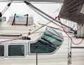 More power: The previous owner did a lot of remodelling. The deck saloon ends, as does the rail. The foresail is too small. A barberhauler helps