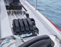 Halyards and sheets are operated by the helmsman. However, the standard winches are too small