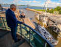 Right in the middle of the action.  Eugen von Abel watches the departing boats from the platform