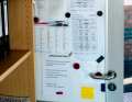 In the lock tower. Watch schedules hang on the door, ...
