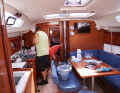 On board an Oceanis, people clean and screw at the same time. Philippos Koch and Björn Seifert clean up