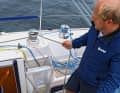 Fasten the halyard: Lower the halyard and tighten the halyard line. If you do not have a halyard line as a downhaul, remove the sail completely
