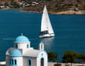 Typical Dodecanese: a white and blue chapel. We sail past it to the next harbour.
