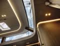 The panes in the superstructure are curved, as is the panelling of the main bulkhead.