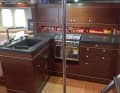 The U-shaped pantry looked chic with the black worktop, but it felt cramped.