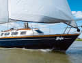Le demi-tonneau "Naja" a été construit au Whisstock's Boatyard à Woodbridge, en Angleterre.