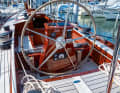 The original tiller steering gave way to a new system with a generous wheel.