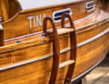 The swim ladder is 1 metre long and 34 cm wide, rests with the upper step on the coaming and is held on both sides with rubber plugs in the eye of each jib traveller.
