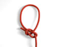 The bowline is used to attach a fixed loop to the end of a line. This can be useful when tying up.