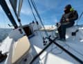The tiller provides a direct feel for the boat. The helmsman sits high up on board, relaxed for longer. However, the genoa winches on the roof remain out of his reach.