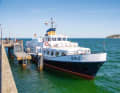 The ship awaits the mourners at the end of the pier in Binz.