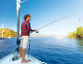 Relaxation after a long day of sailing: fishing in an anchor bay.