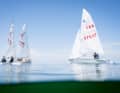 420 sailors wait for wind in 30-degree heat. Scenes from the calm during Kiel Week 2025.