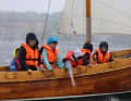 Defying wind and waves: Fourth-graders from Kiel Waldorf School on a sailing cutter.