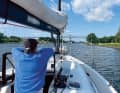 The difficult passage through the lock is followed by a leisurely canal trip.
