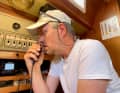 Skipper on the radio. Andreas Auras has been sailing for many years and is also a podcaster ("Die Segelkneipe").