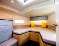 The owners sleep in the bow in great comfort. There is an abundance of storage space.