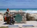 Arrival by bike at Cape Agulhas, the southernmost point of South Africa.