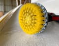 A larger brush is best for large surfaces, whilst smaller ones are needed around fittings.
