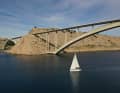 The 41-foot charter boat from in2theblue beneath the Krk Bridge.