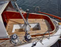 The cockpit is relatively small and is dominated by the long tiller.