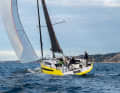 The multi-buckling frame design is particularly evident at the wide stern.
