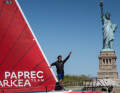 French Transat CIC winner Yoann Richomme in front of the Statue of Liberty, which France once gave to America