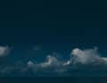 When the clouds pile up on the horizon at night