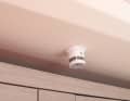 The sensors are powered by an internal battery, here the smoke detector.