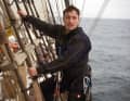 Y-Kollektiv author Lukas Wiehler in the rigging of the "Gorch Fock". For his report, he became part of the crew and sailed with them for a fortnight, from the Azores to the Scottish Shetland Islands.