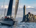 Here, Jens Kellinghusen's Ker 56 "Varuna" rounds off the famous Fastnet rock