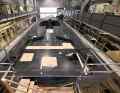 The deck is made from carbon prepregs on a Nomex core