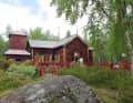 A wooden church from the 18th century in the middle of the forest.