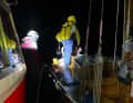 The darkness and rough seas made the operation more difficult.
