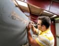 As part of the restoration, the original ornamental moulding was highlighted and gilded again. It identifies the ship as an Alfred Mylnes construction