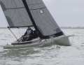 Pretty lines, little freeboard, pronounced deck leap. The graceful lines come from designer Michele Molino