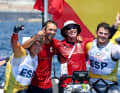 Here the Spaniards celebrate Olympic gold with their coaches