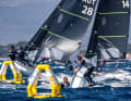 Here Keanu Prettner and Jakob Flachberger from Austria are storming away, while the leading crew from Uruguay has capsized.