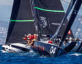 Tony Langley's "Gladiator" had a strong day in light winds.