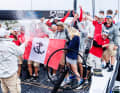 A well-earned champagne shower followed in the harbour.