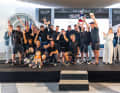 Celebrating second place in the Maxis: Sven Wackerhagen (Kieler Yacht-Club) and his crew at the award ceremony.