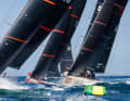 Strong winds, plenty of waves: the Rolex TP52 World Championship got off to a furious start off Cascais. Platoon Aviation" can be seen with bow number 2.