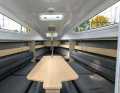 The interior has a very open design. At 140 by 65 centimetres, the saloon table offers plenty of space