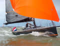 Test in strong winds. The helmsman works far forward directly on the superstructure, protected by the flexible disc.