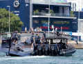 "BoatOne" arrives at the dock of the Swiss headquarters in Barcelona