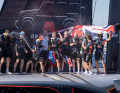 Champagne fountains, clenched fists, an exuberant crew and the team chairman right in the middle of it all: Jim Ratcliffe (in white shirt) enjoys the success of his racing team with the crew on board "Britannia"