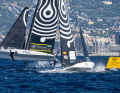 Here the Swedish team storms over the Cup course, Spain's Sail Team BCN follows