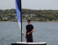 The sail is fitted over the split mast and has battens.