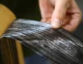 Rolls: The fibres are spread, impregnated with resin and pre-assembled